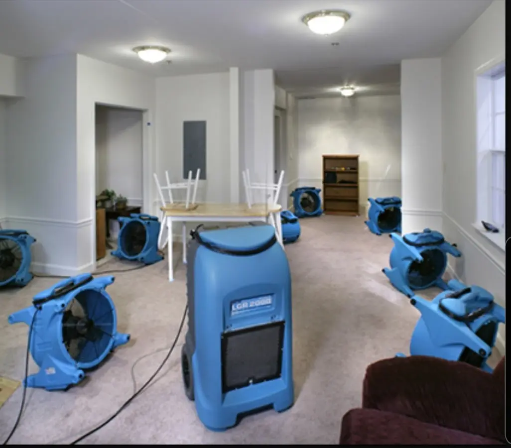 Air movers and dehumidifier setup for Water Extraction & Removal in Harris